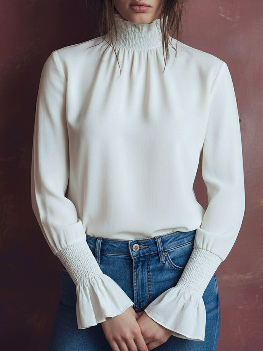 Elegant High Neck White Blouse With Smocked Cuffs And Ruffle Details